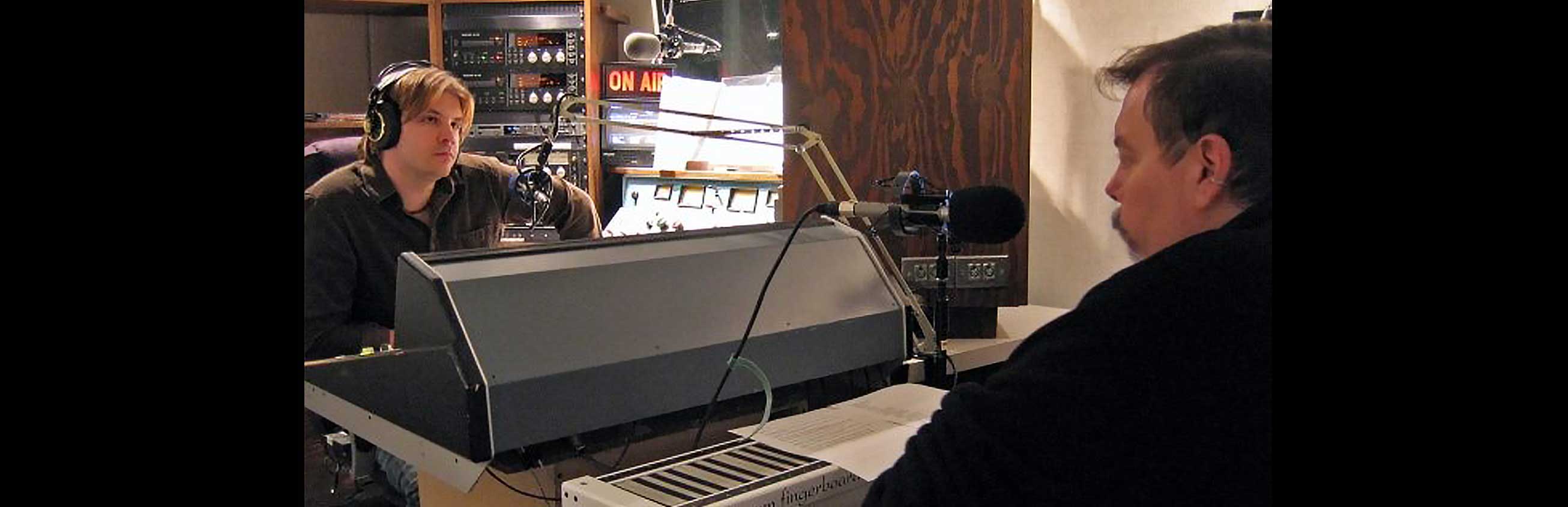 Richard on air with Treavor Hastings at WDFH, 2005.